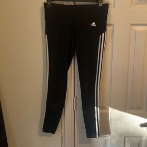 Adidas leggings. Black with the white striped. Size L